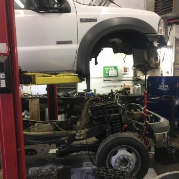Diesel mechanic services being performed