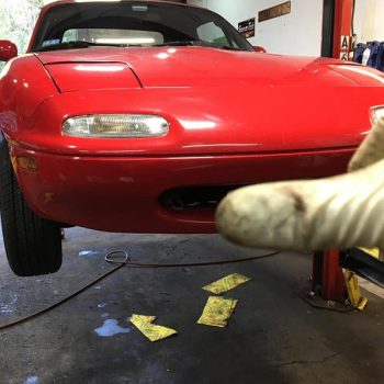 red car in garage